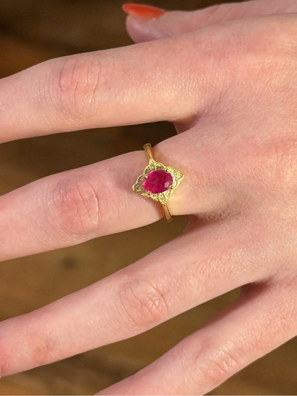 Stunning Natural 7x5mm Oval Ruby Zircon  accent in 14K Yellow GP Ring Size 6